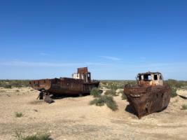 Fishing boats rusting in the desertified Aral Sea