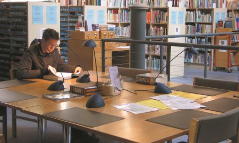 Student studying in a library